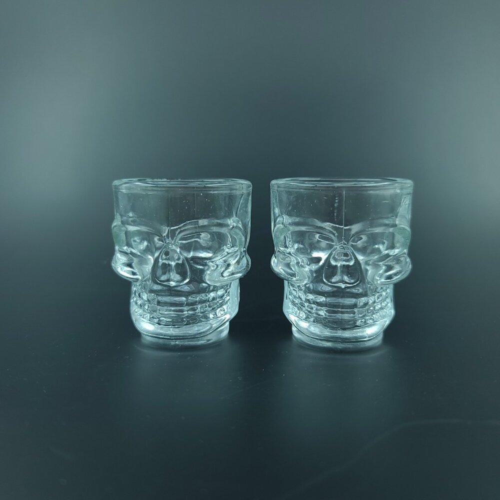 Set of 2 clear glass skull shot glasses